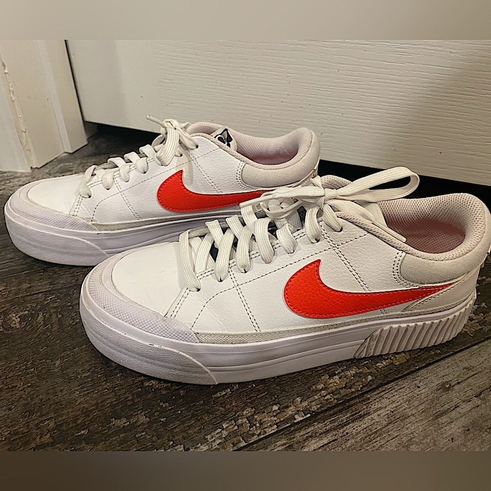 Women’s White and Orange Leopard Nikes sz 7.5 EUC